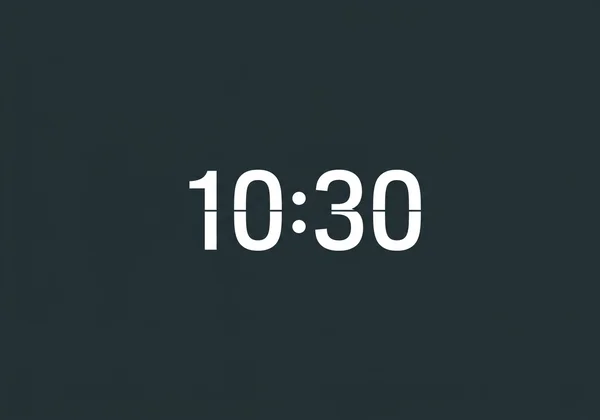 Sleek minimalist digital clock with white text on dark background